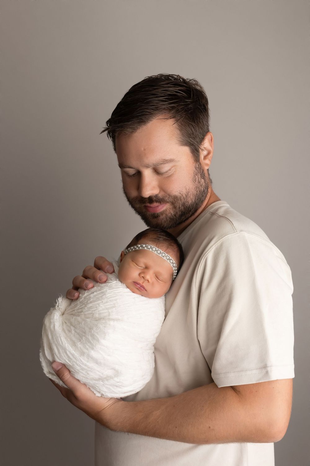 Baby girl with father, taken by Jen Knightstep, Photographer