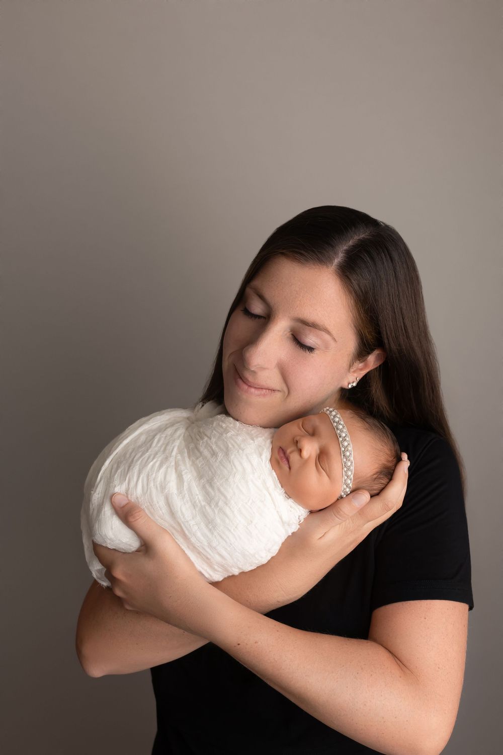 Baby girl with mother, taken by Jen Knightstep, Photographer