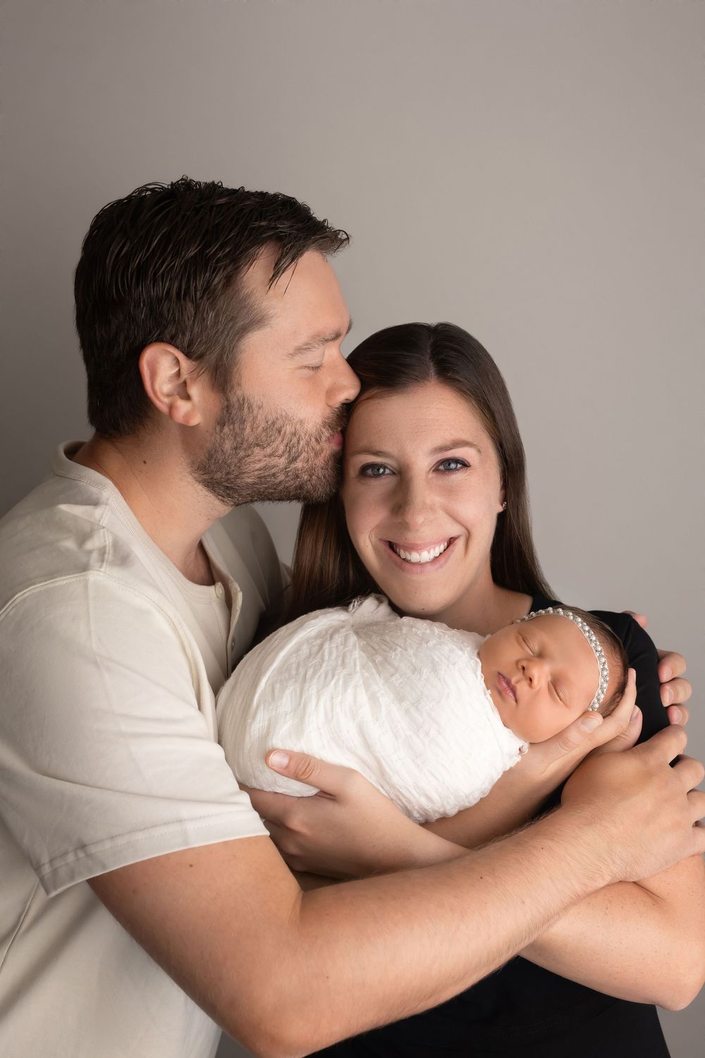 Baby girl with family, taken by Jen Knightstep, Photographer