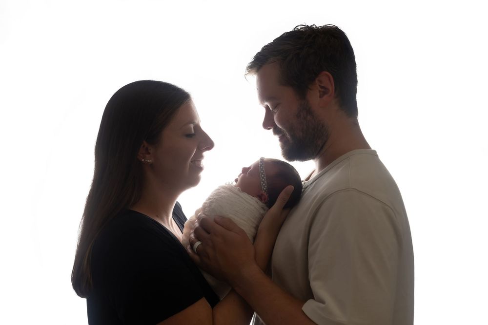 Baby girl with family, taken by Jen Knightstep, Photographer