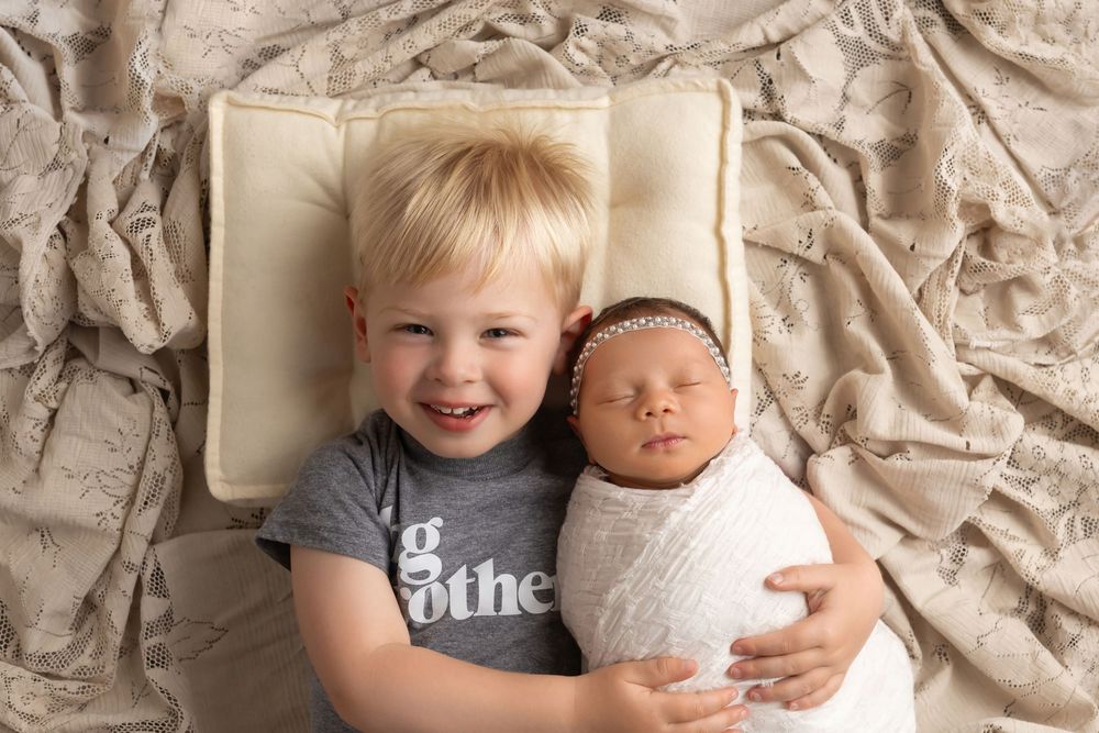 Baby girl with toddler brother, taken by Jen Knightstep, Photographer