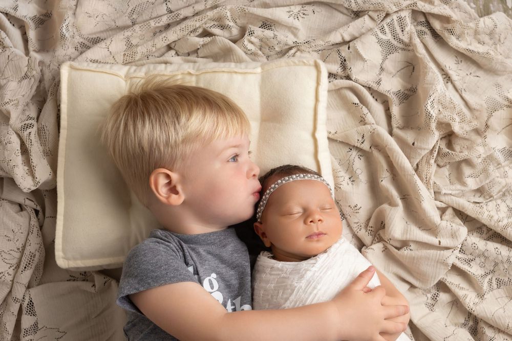 Baby girl with toddler brother, taken by Jen Knightstep, Photographer