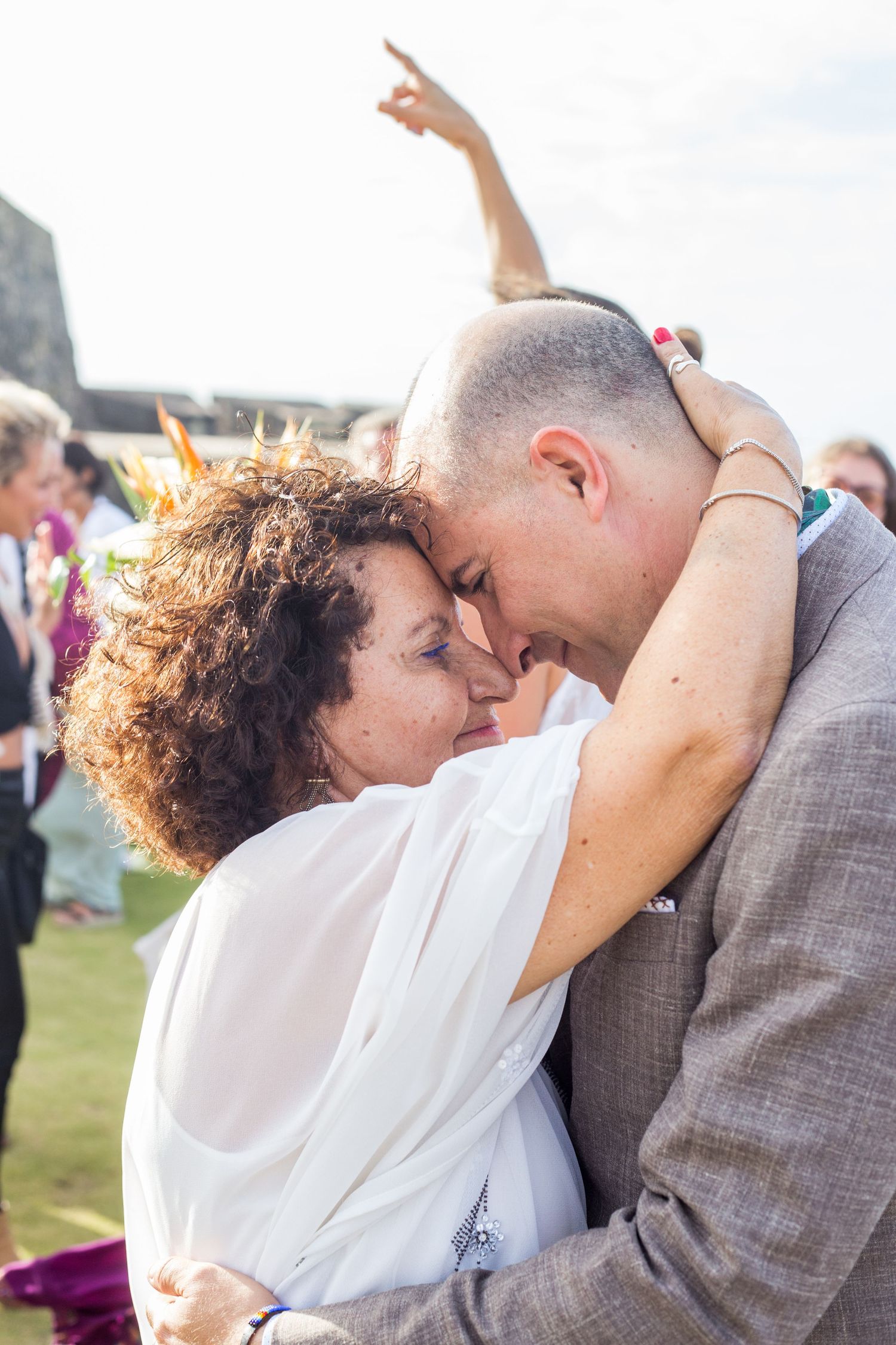Surprise wedding. Groom and his mother. El Morro. Old San Juan, Puerto Rico.