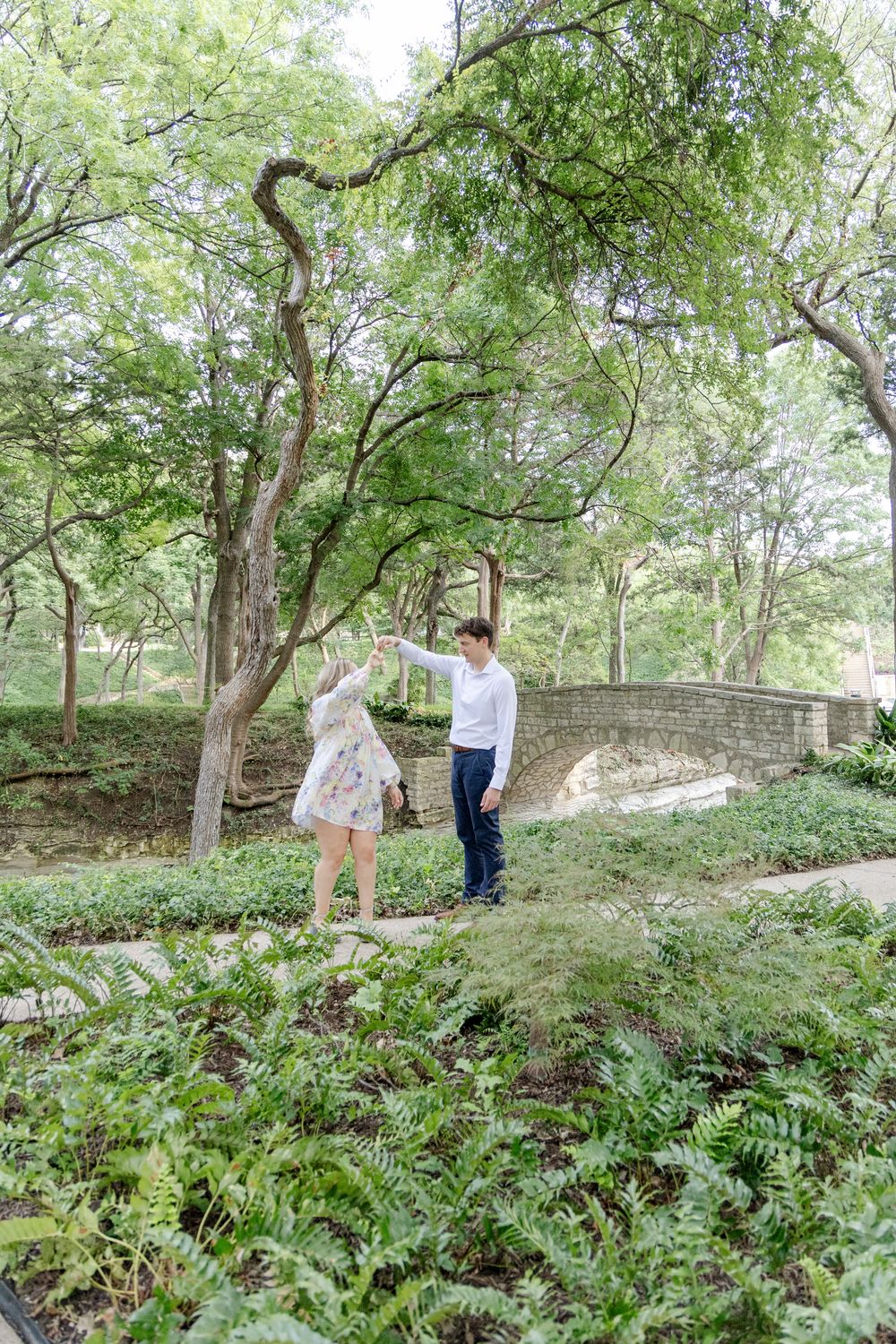 Romantic Austin engagement session with vineyard backdrop at sunset