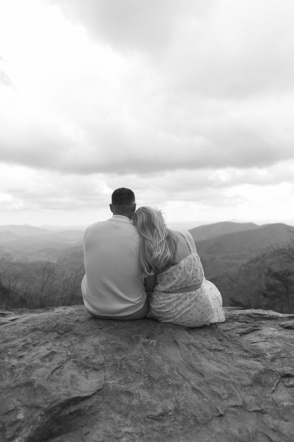 Bride and groom portraits with cloudy skies over Dahlonega Georgia mountains