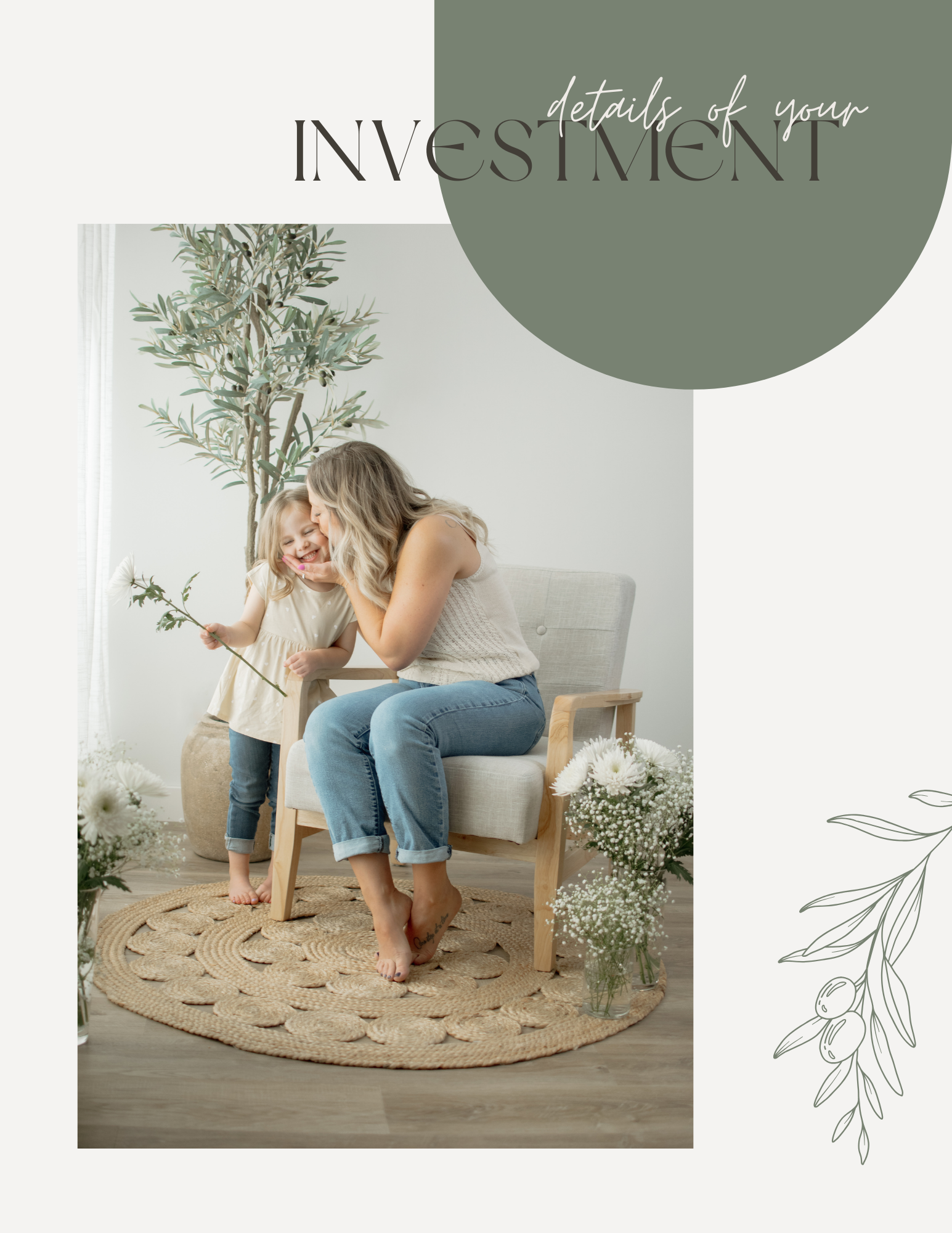 A mother and young daughter share a joyful moment on a woven rug beside white flowers in a bright, airy room.