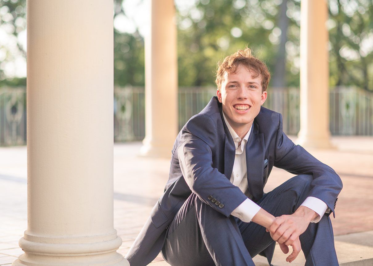Bartlesville High Senior Guy Session at field by Bartlesville Senior Photography Kristi Bray