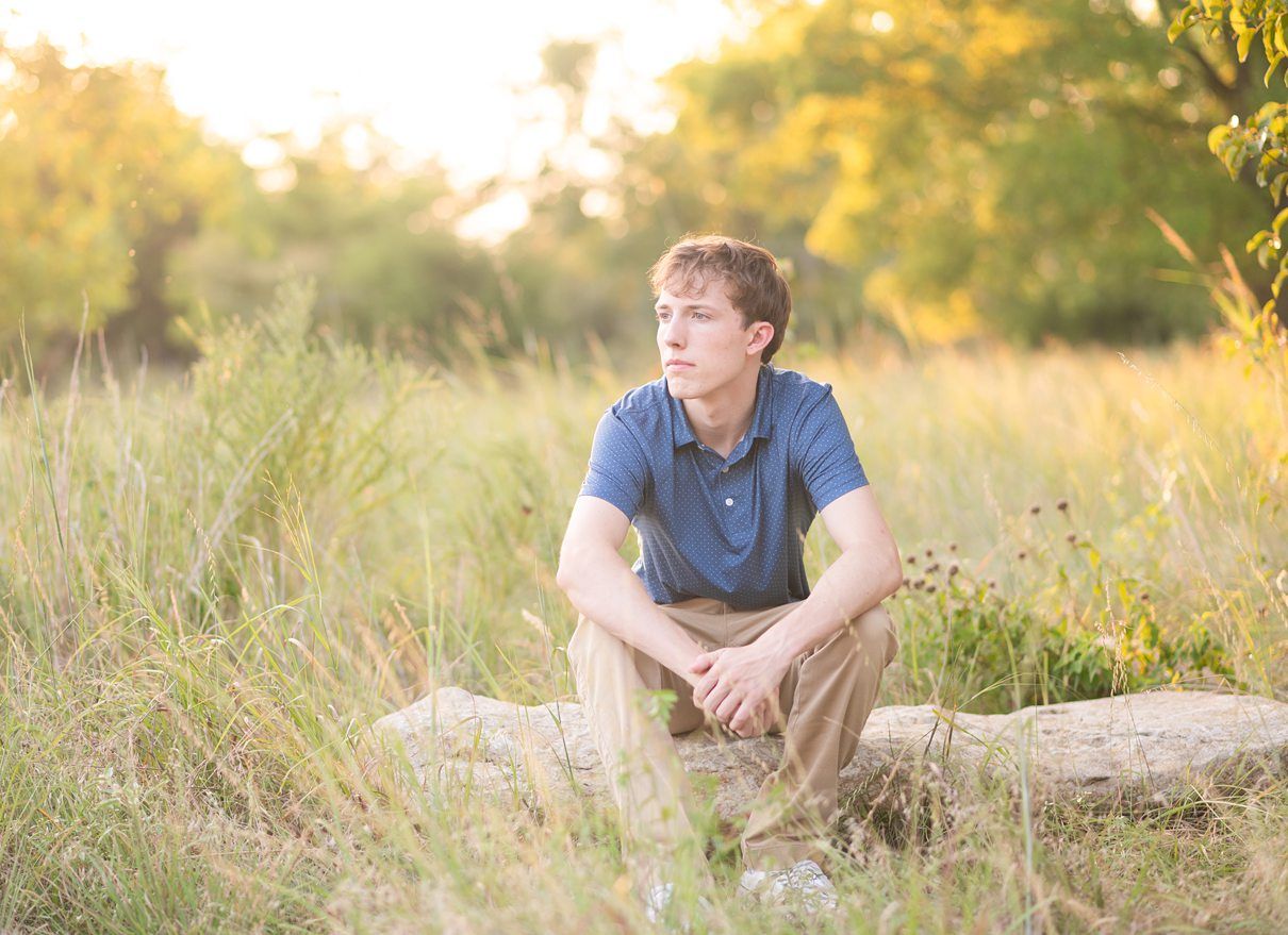 Bartlesville High Senior Guy Session at field by Bartlesville Senior Photography Kristi Bray