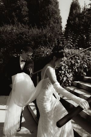 A sequence of candid wedding moments captured along a garden pathway.