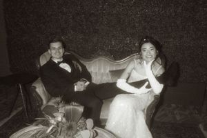 Vintage-style black and white photos displayed in a sequence showing romantic moments.