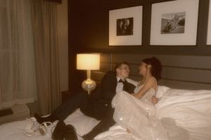 Romantic hotel room scene with soft lighting and vintage decor.