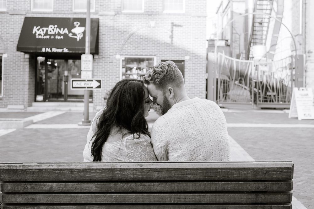 A series of black and white photographs showing people sitting on benches in urban settings.