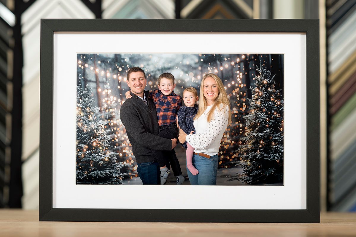 Framed Christmas family photograph displayed as a thoughtful festive gift, part of the 2025 Winter Wonderland mini sessions in High Wycombe.