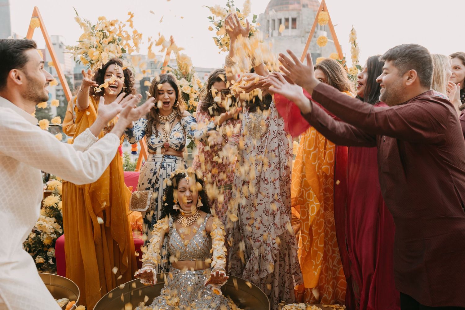 Joyful celebration with orange and gold decor elements creating a festive atmosphere.
