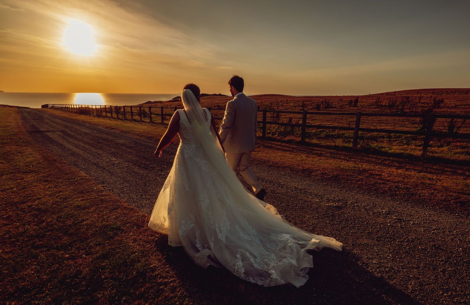 A romantic sunset wedding photo sequence showing silhouettes against a golden sky with a rustic wooden fence in the background.
