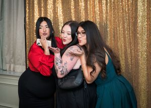 A series of four photo booth style images showing people posing and having fun against a gold sequin backdrop.