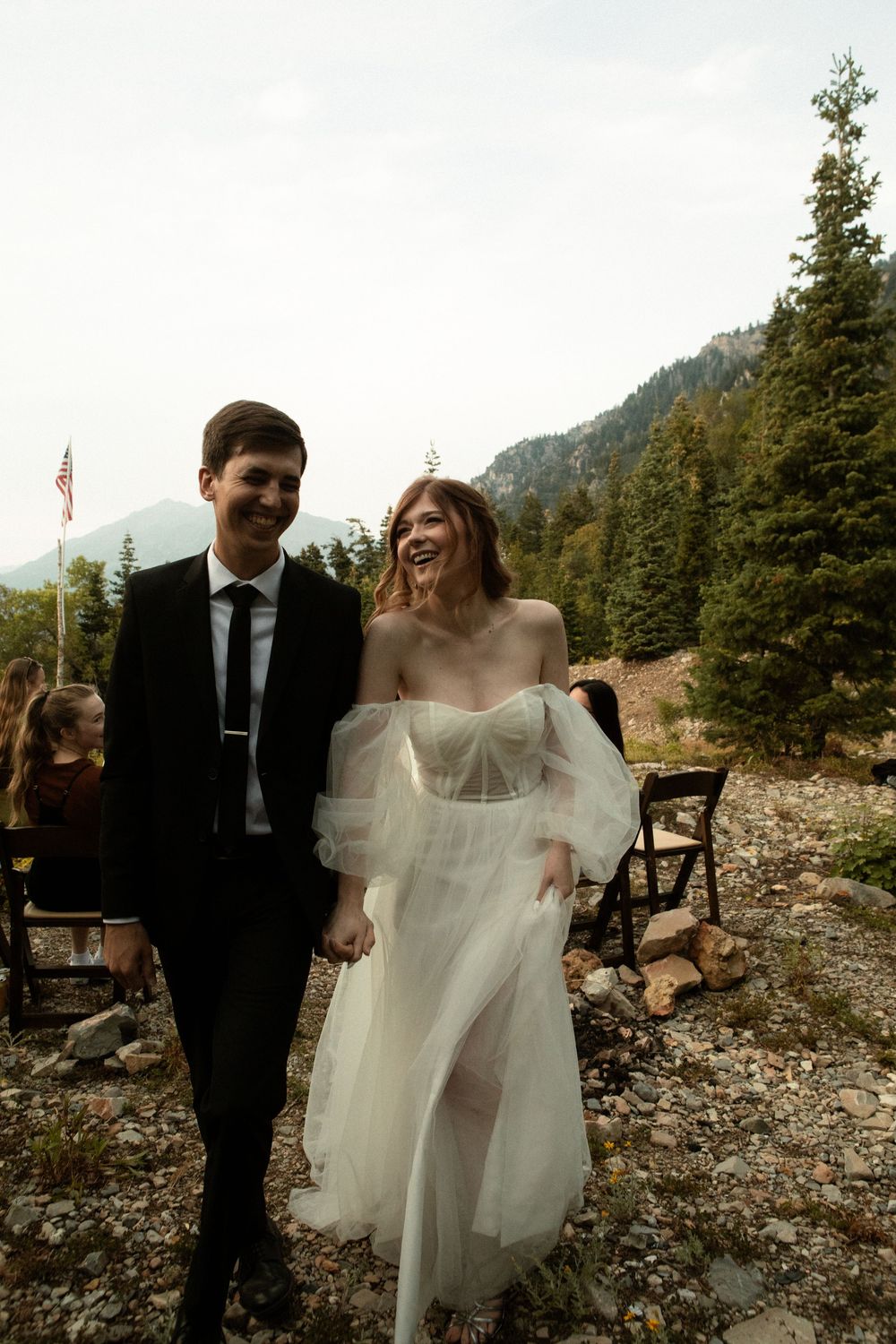 Walking down the isle after saying I do - authentic & emotional wedding imagery.