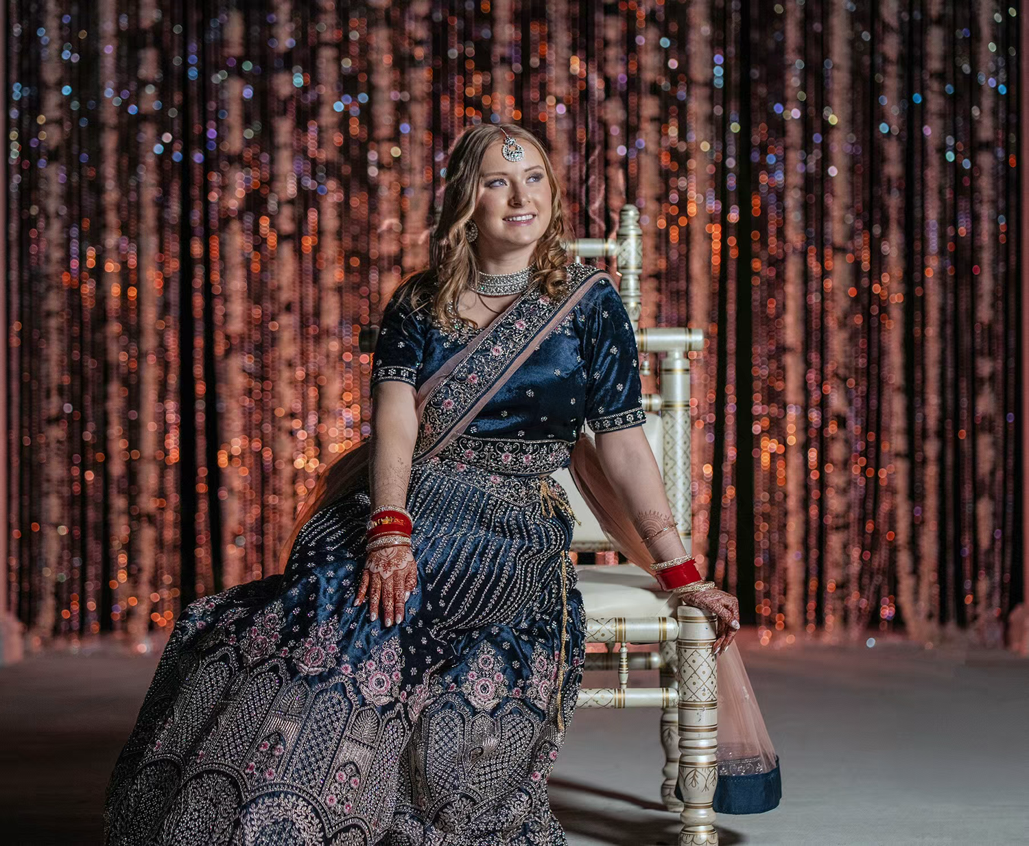 a bride posing  poses at white willow meadows venue