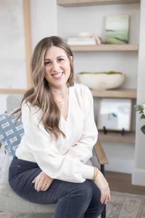 Holly Bero Interior Designs in Puyallup, WA headshot photo of woman sitting in office decorated space