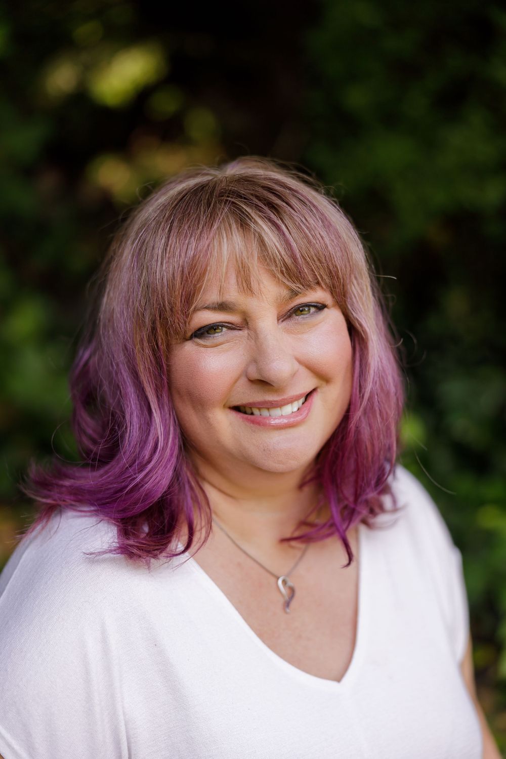 woman massage therapist personal branding headshot outdoor in nature in Bothell, WA