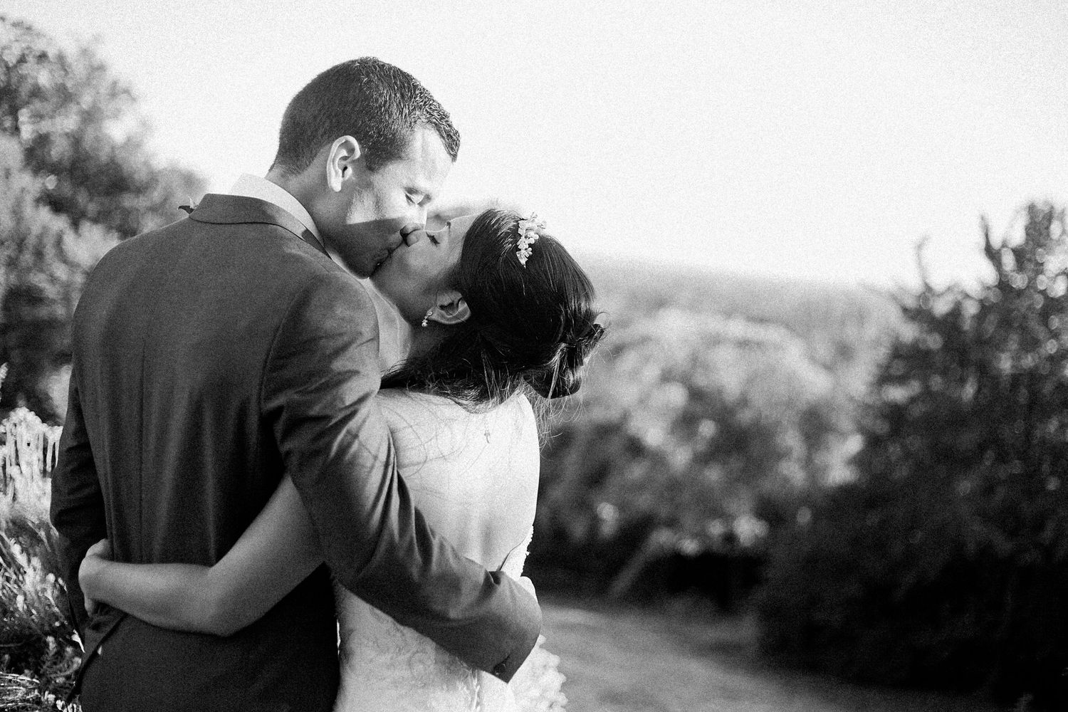 Tylney Hall wedding photography showing the bride and groom in the beautiful grounds