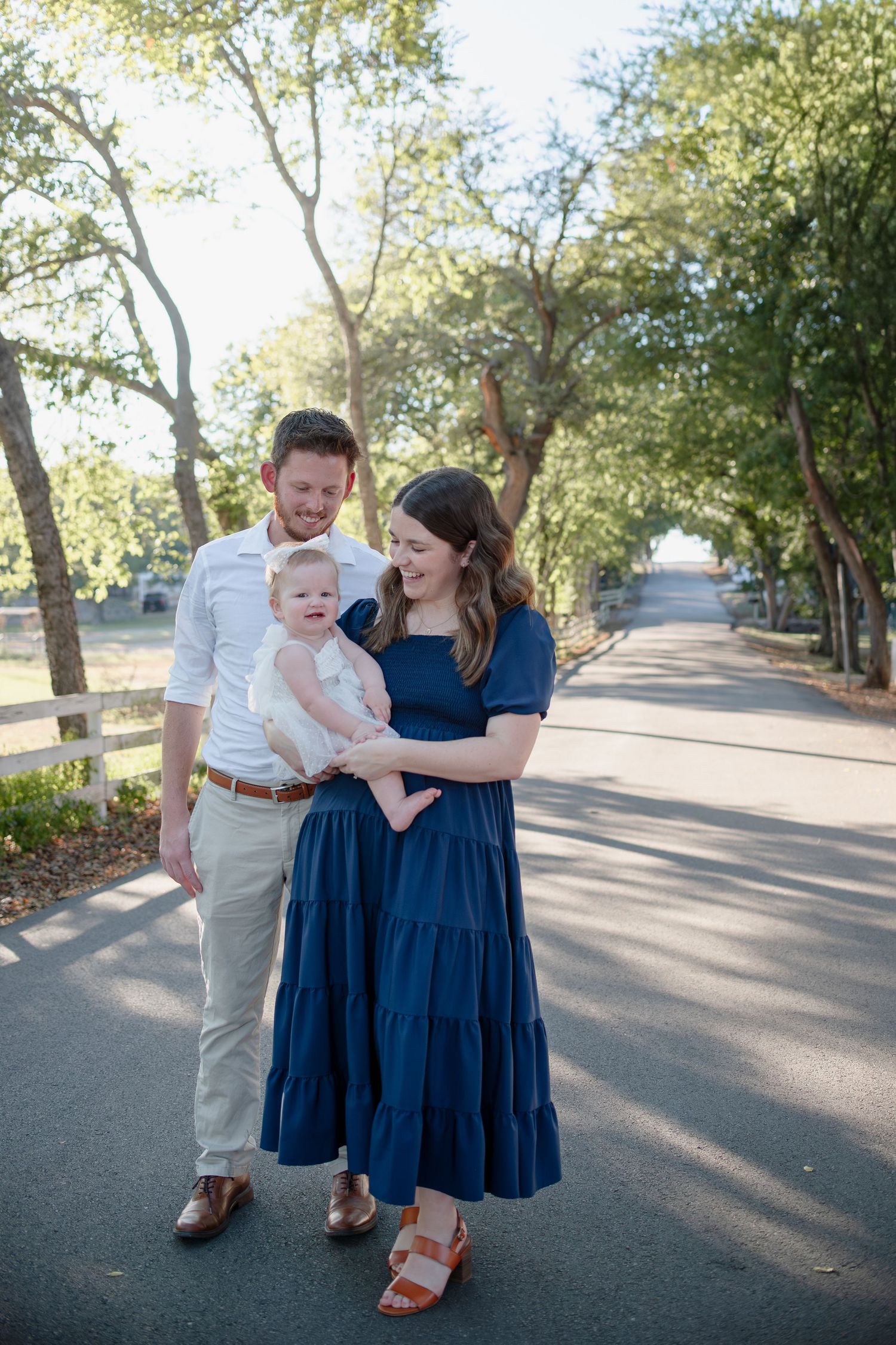 Family walking together during session at Pace Park in Salado Texas
