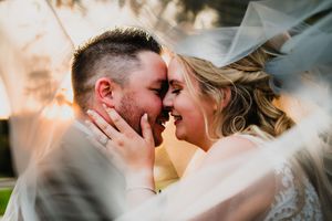 A romantic wedding couple shares intimate moments together in a series of candid photographs.