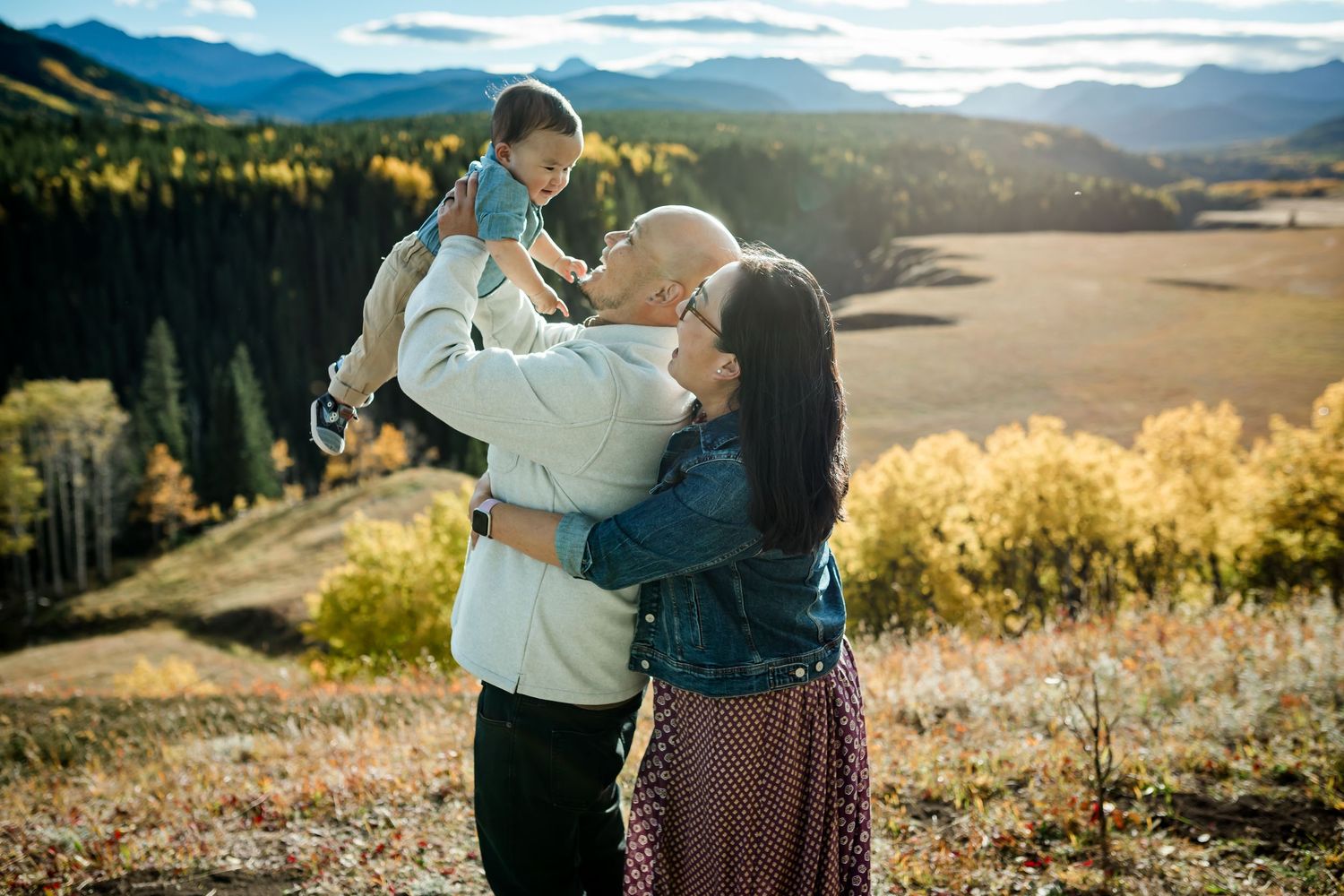 Golden hour fall family photos at Bighorn Lookout in the Kananaskis mountains by Calgary lifestyle photographer, Love & Sunshine Photography