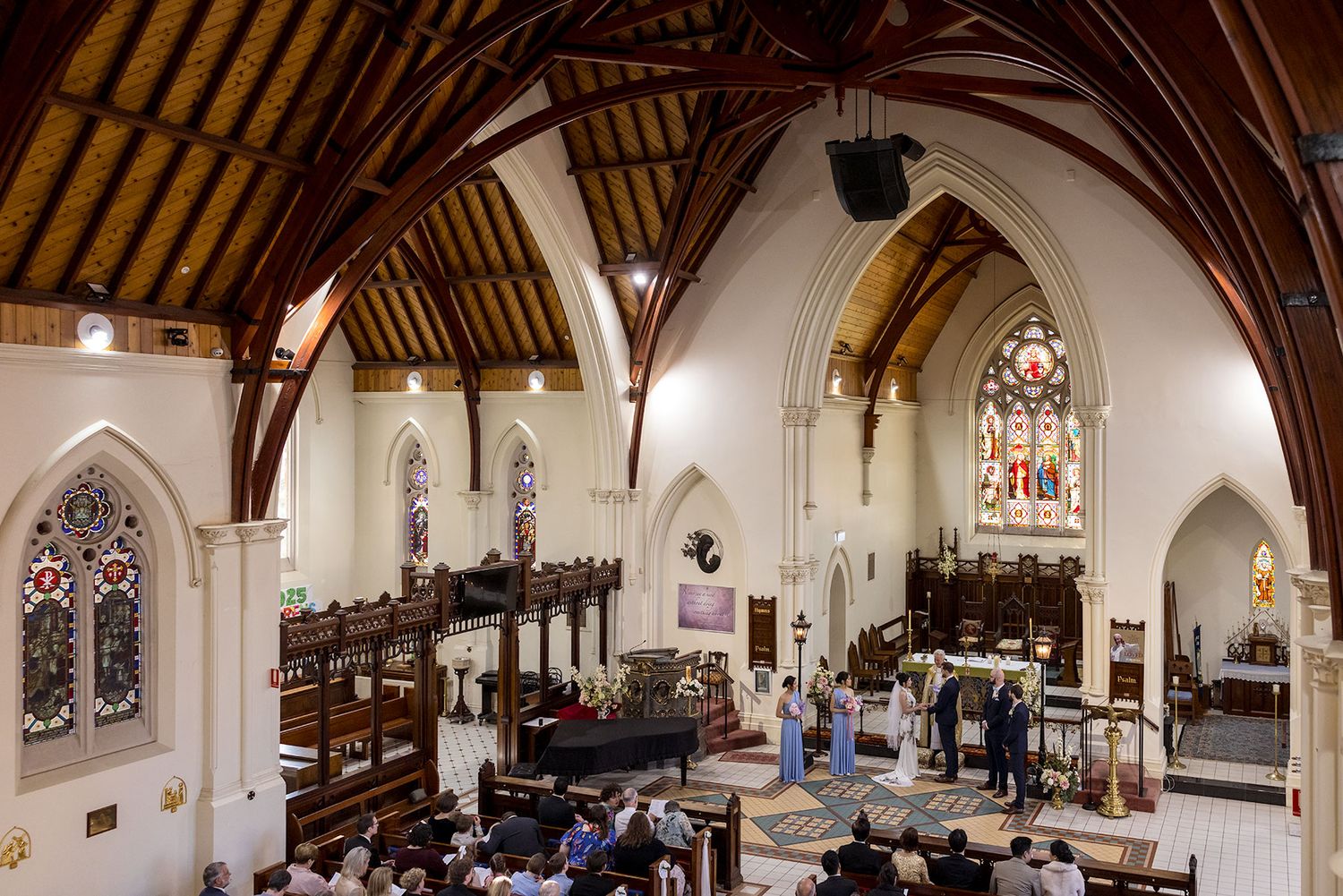Bride and Groom share a moment during their wedding cermeony at St. Matthews Church in Albury. Photo by Jason Robins
