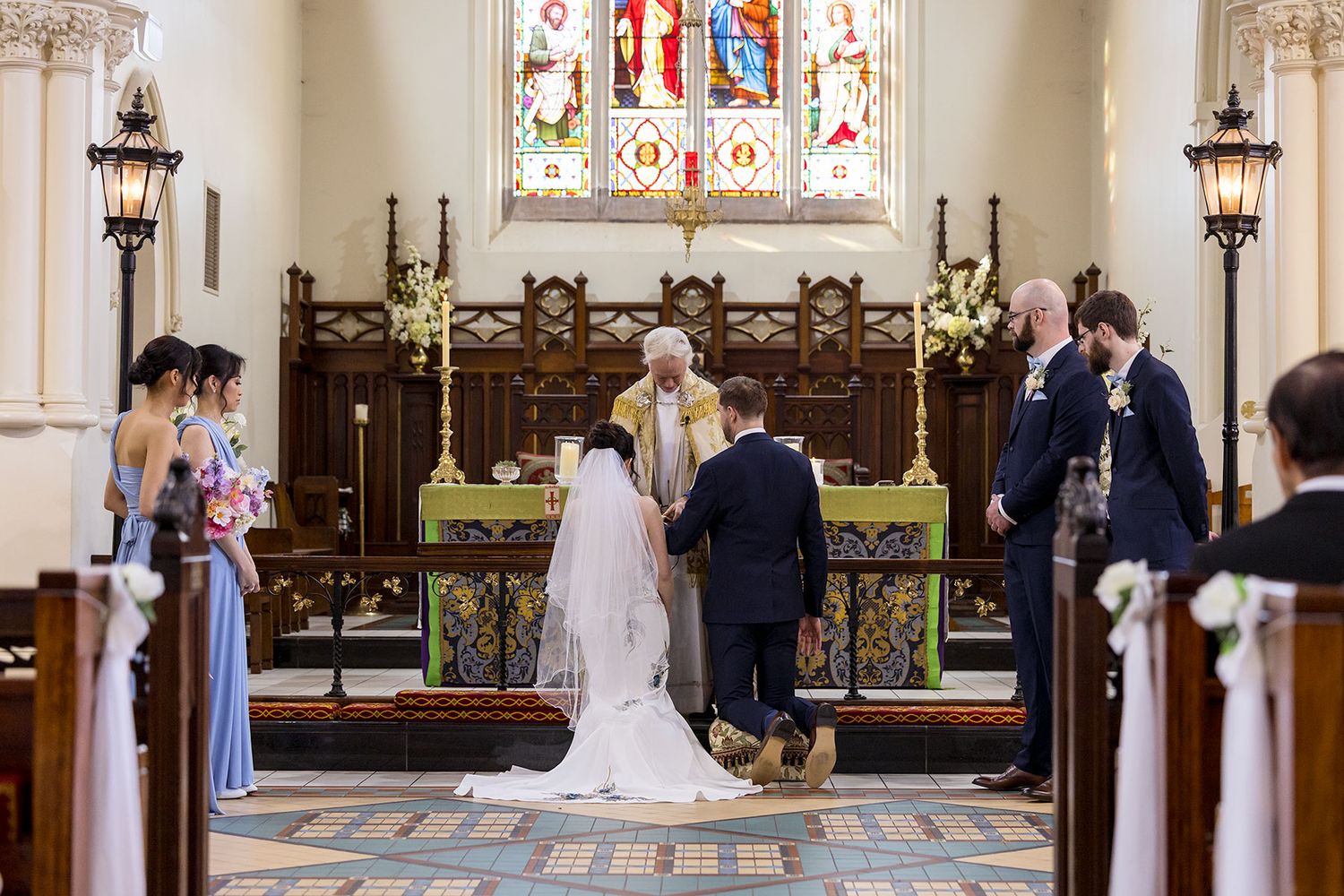 Bride and Groom share a moment during their wedding cermeony at St. Matthews Church in Albury. Photo by Jason Robins