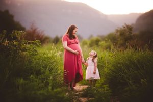 Urso Photography outdoor maternity session in a wildflower field near Chattanooga.