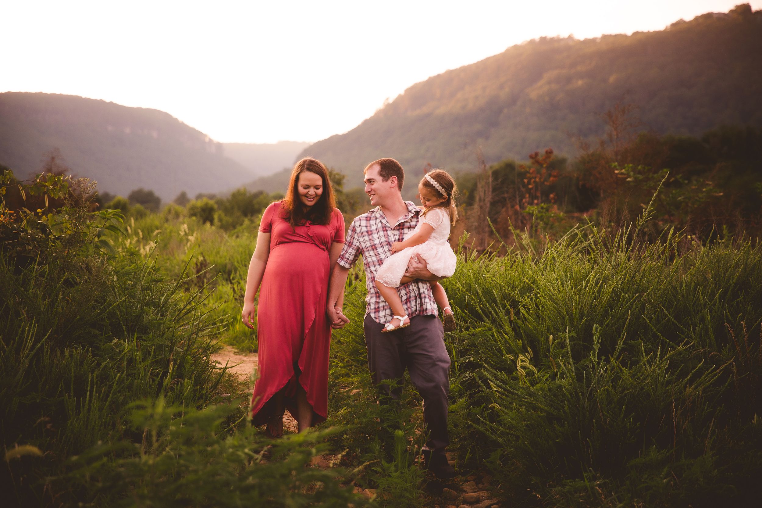 Maternity sunset photo in Soddy Daisy, TN, captured by Urso Photography, the journey to motherhood in a beautiful natural setting/
