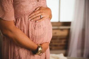 Elegant studio maternity photo in Chattanooga captured by Urso Photography.