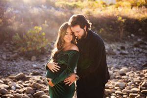 Mother-to-be photographed in nature by Urso Photography during a maternity session.