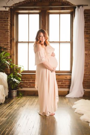 Soft and intimate maternity photo in the Urso Photography studio in Chattanooga.