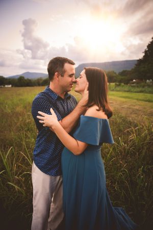 Couple expecting their baby during an outdoor maternity session in North Georgia.