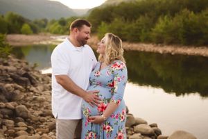 Pregnant mother captured in a peaceful outdoor maternity photo by Urso Photography.