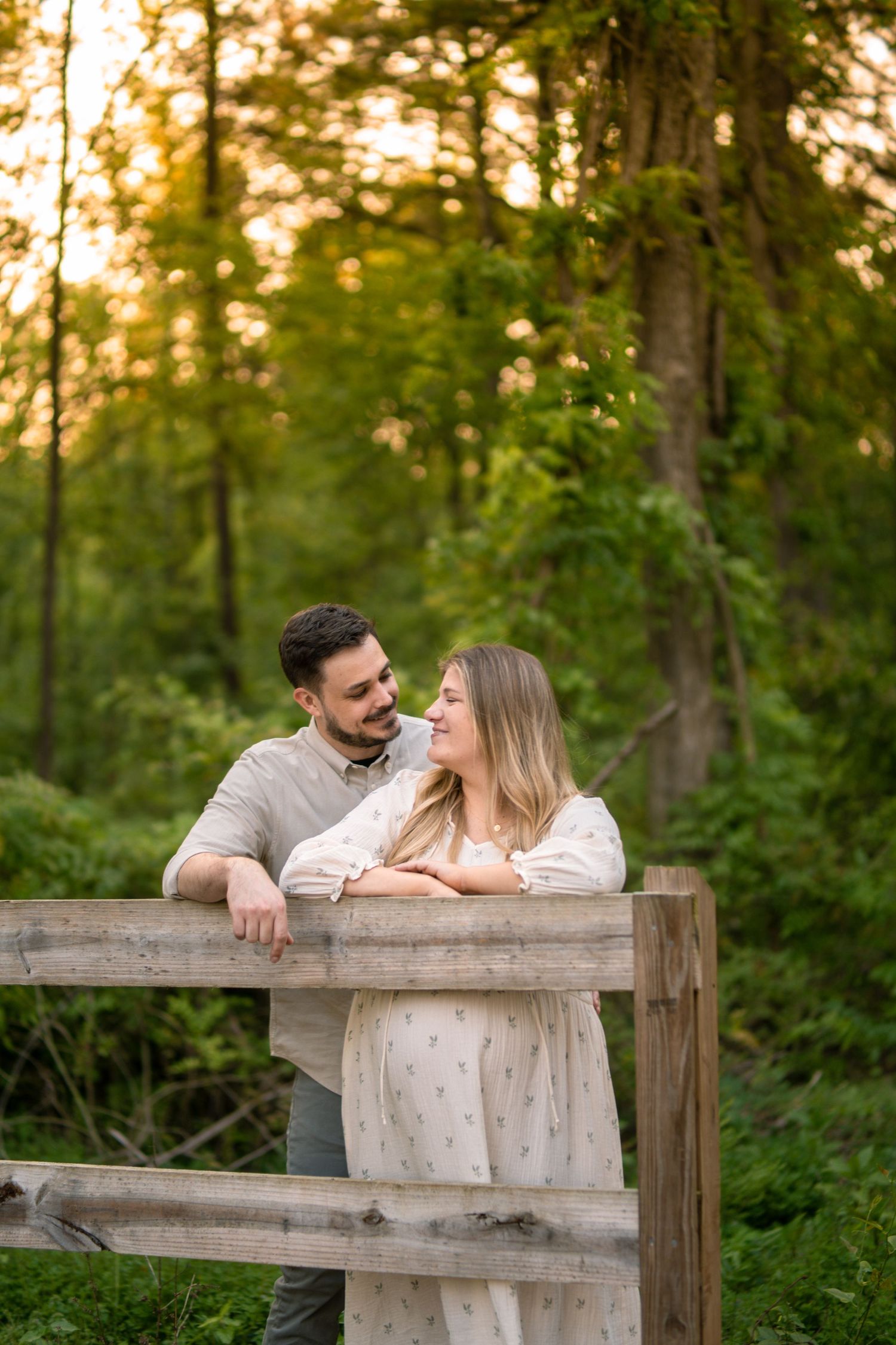 Pregnant wife with husband at a Marietta park maternity session