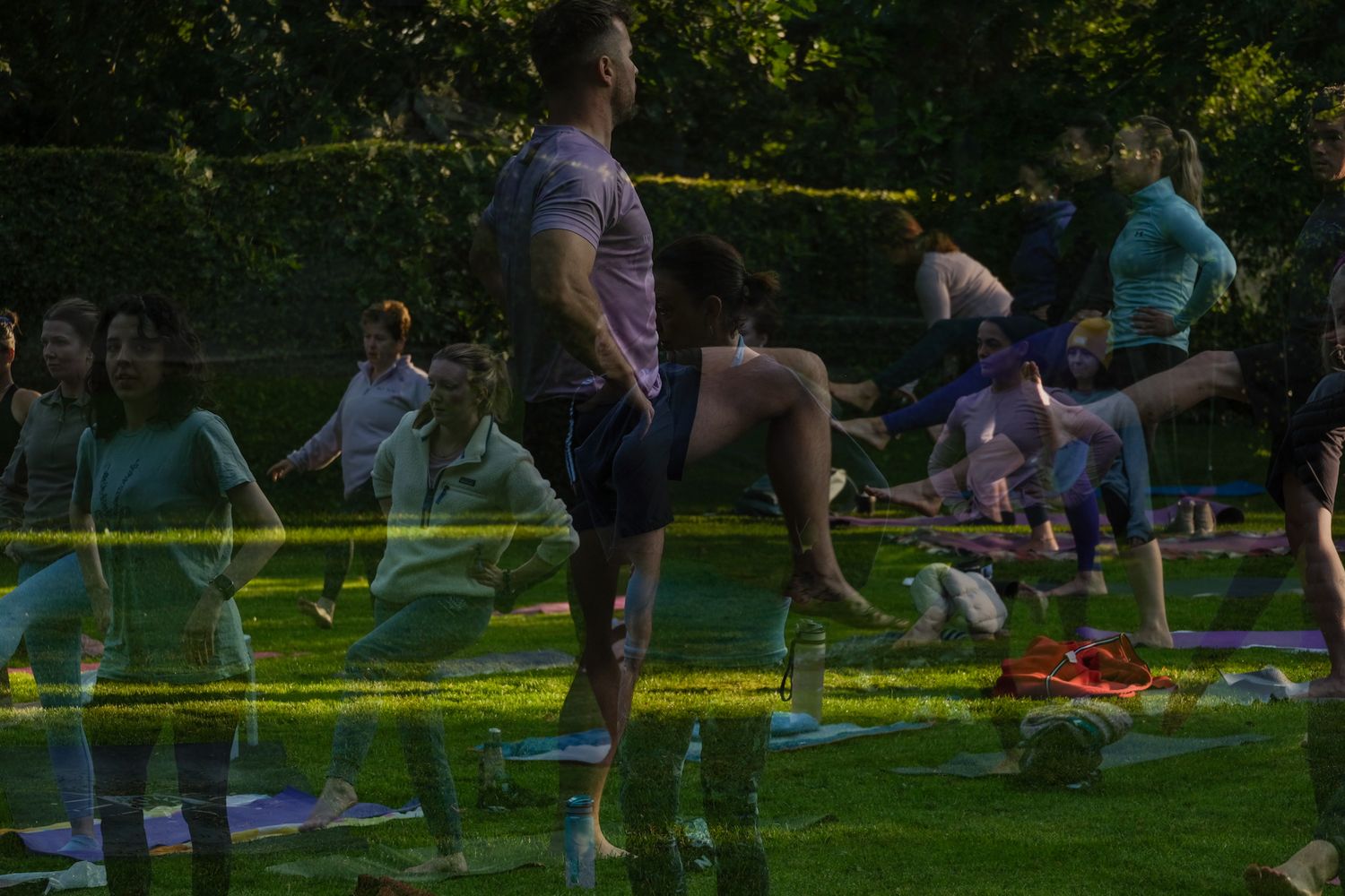 Group fitness class exercising outdoors in late afternoon light.
Kildare, Ireland.