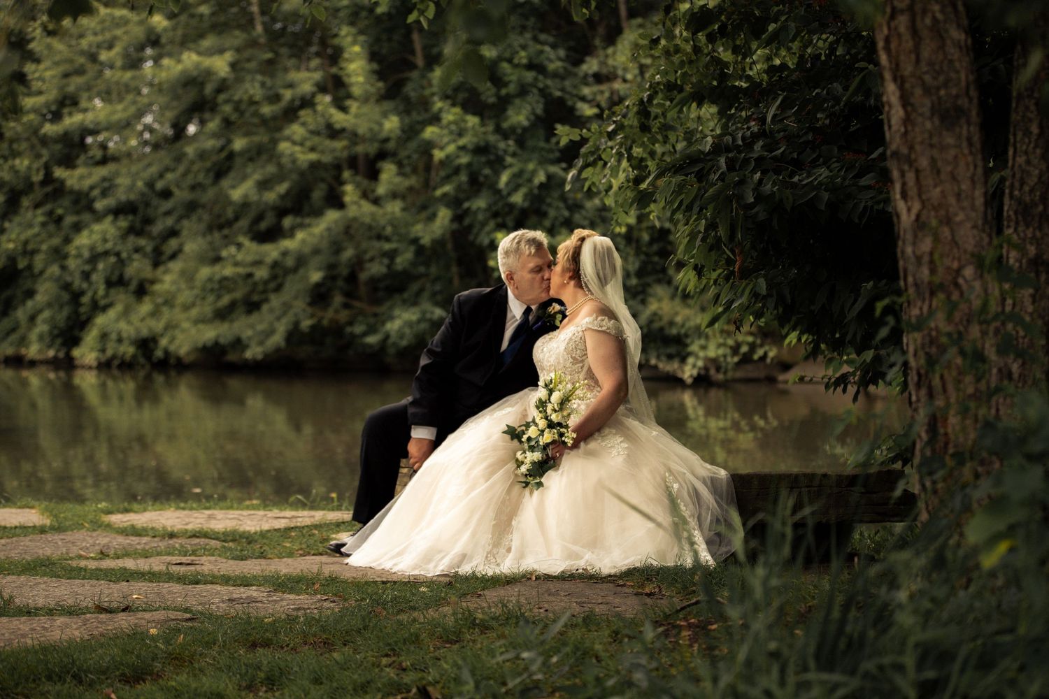 A wedding portrait of couple in the park Saint Claire shores Michigan