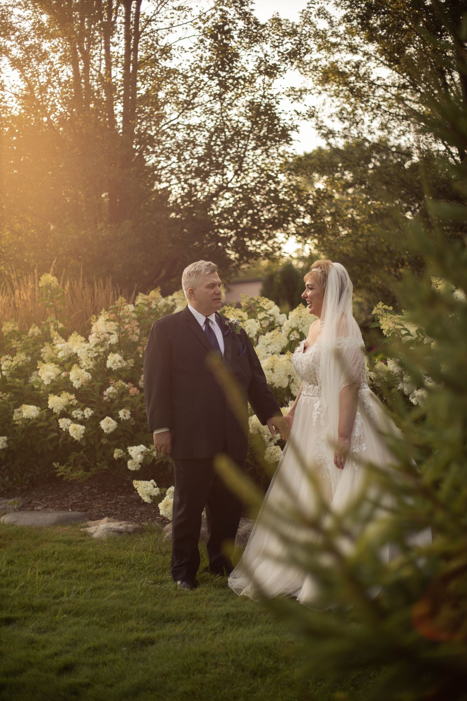 A wedding portrait of couple in the park Saint Claire shores Michigan