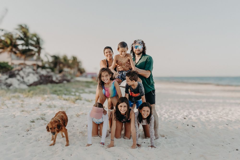 Group photo session at a scenic beach location photoshoot in Puerto Morelos.