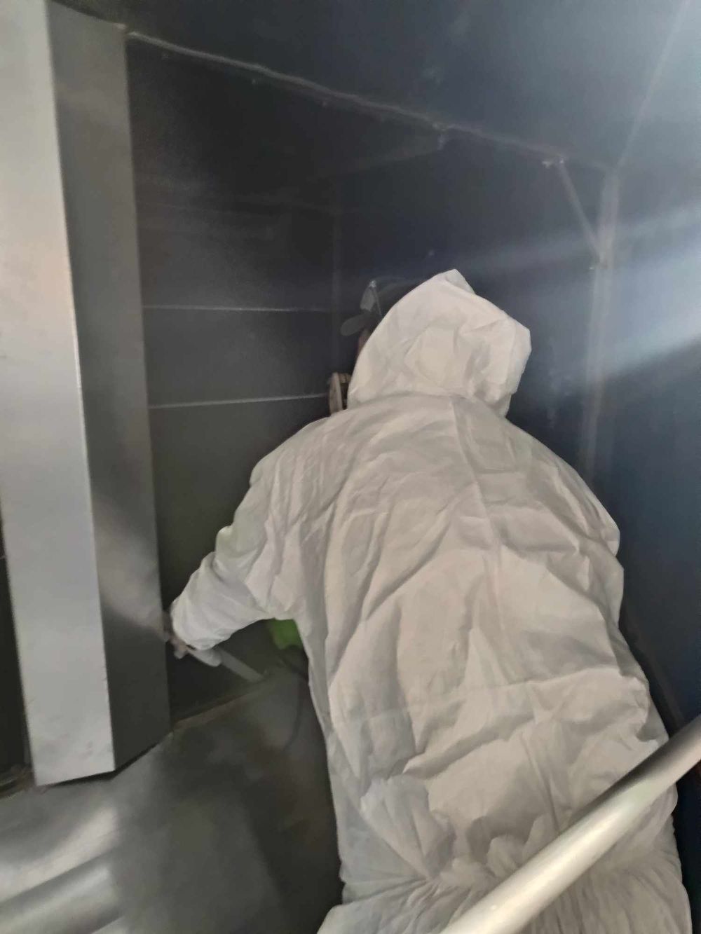 Maintenance inspection of ventilation system in protective equipment.