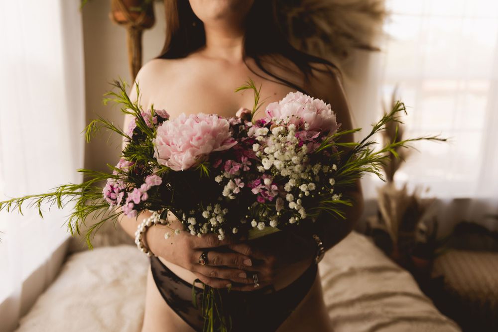 Chic studio boudoir photo session focused on confidence and elegance by Urso Photography.