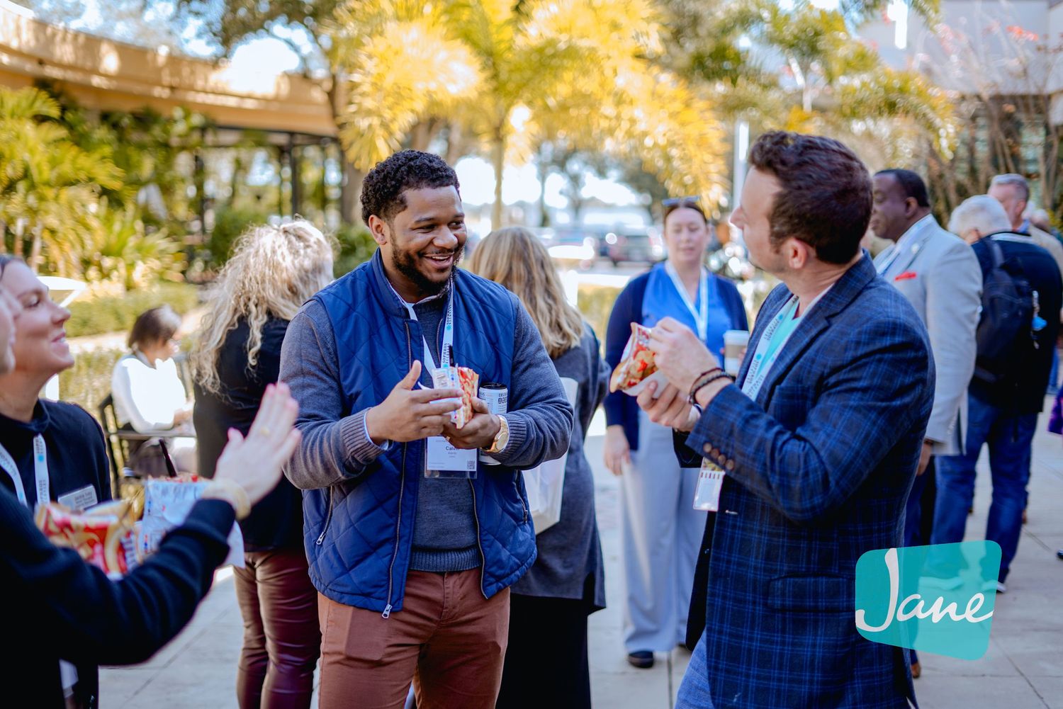 professionals having a conversation at a corporate event