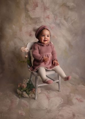 toddler sitting on chair in Portland Oregon photoshoot