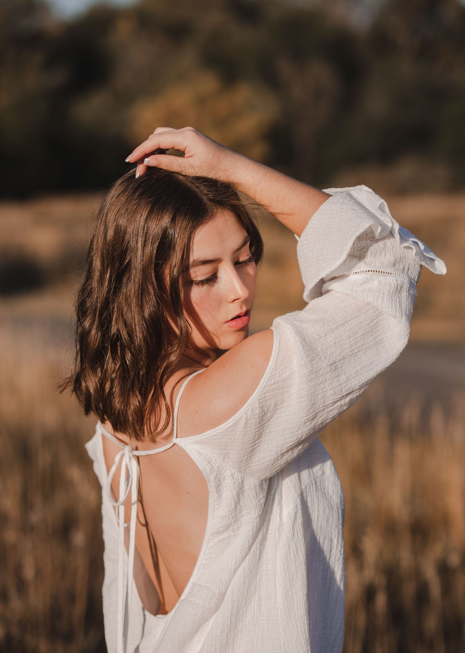 Quiet, introspective portrait in a natural setting with movement and mood | Florida-based lifestyle photographer