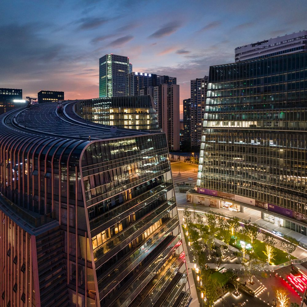 Professional twilight architectural photography of a mixed-use development