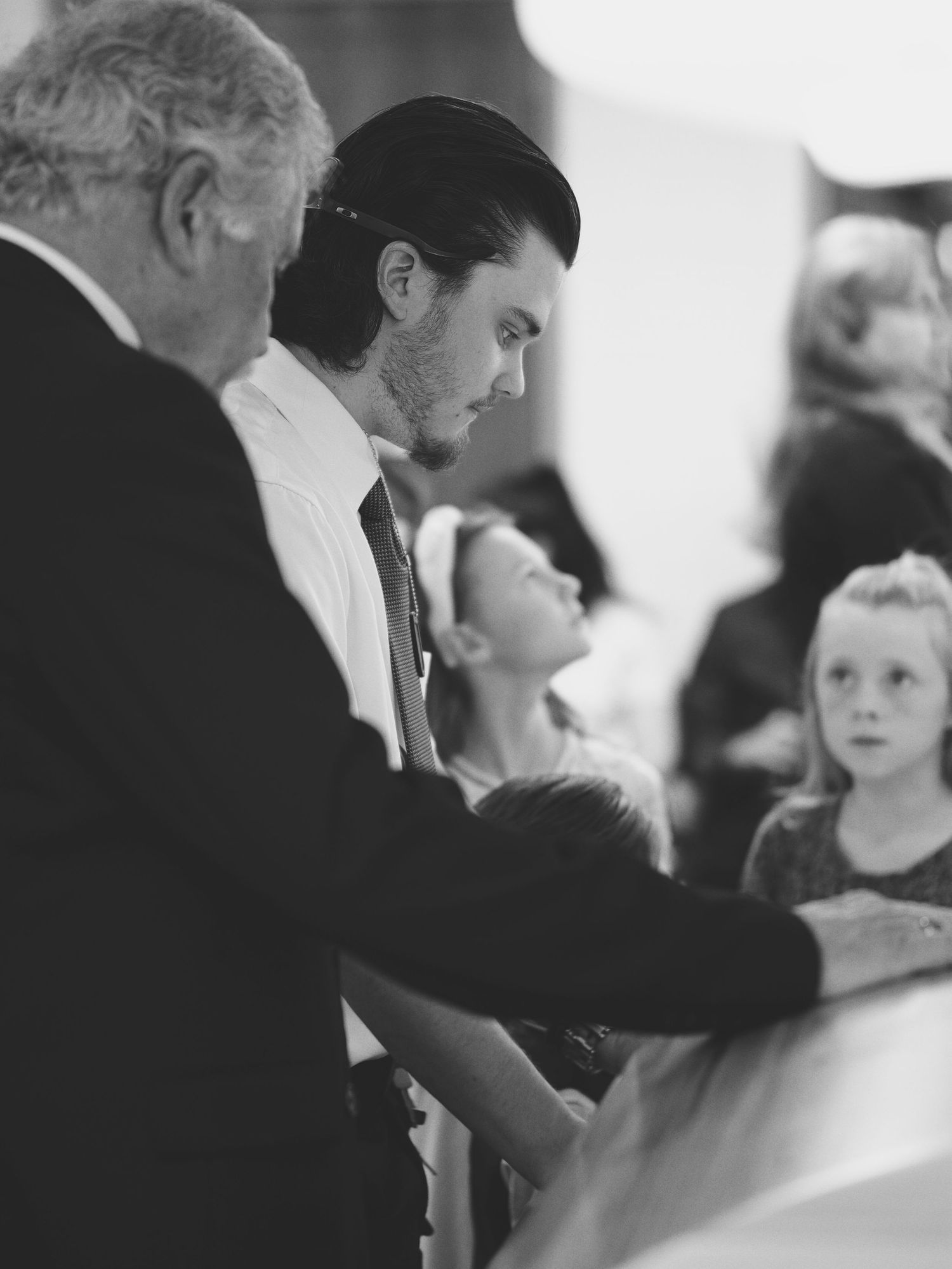 A young man says his final farewell to his father