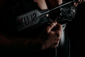 Series of hands holding a defensive tactical pistol in different grip positions during firearms training session. Grand Rapids Boudoir Photo
